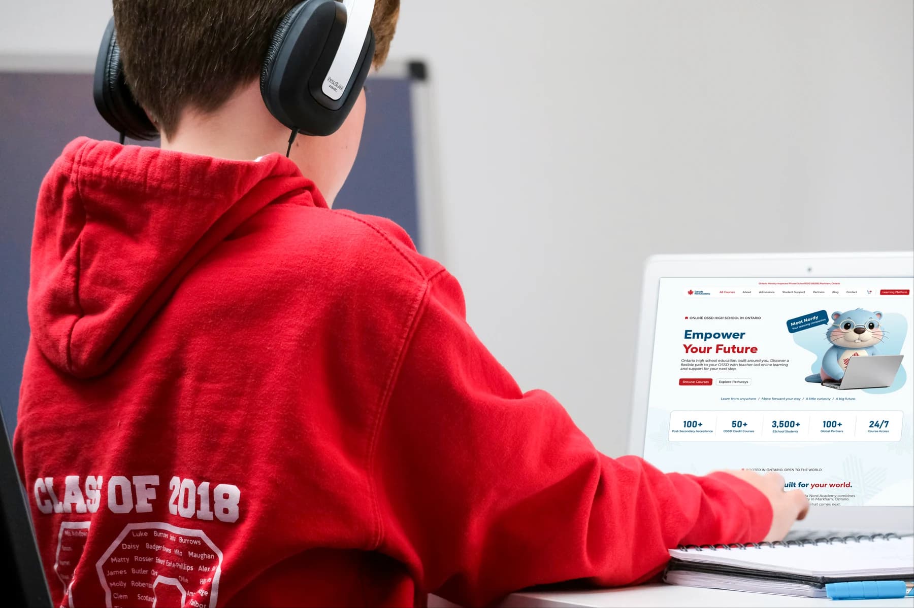 Student using CNA online learning at a laptop